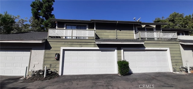 view of front of property with a balcony