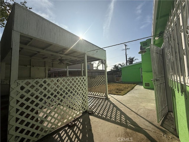 view of patio / terrace featuring ceiling fan