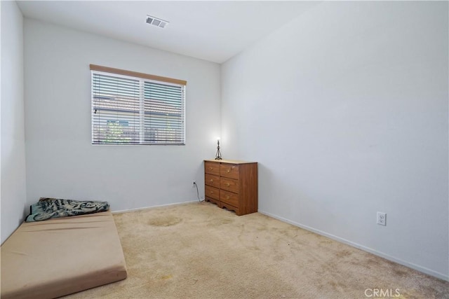 living area with light carpet