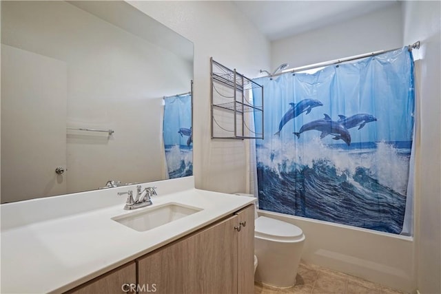 full bathroom with tile patterned floors, vanity, shower / tub combo, and toilet