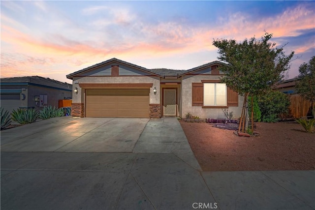 view of front of property featuring a garage