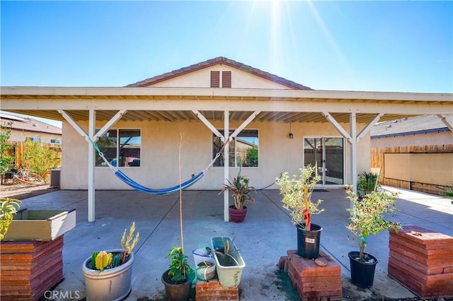 back of house featuring a patio