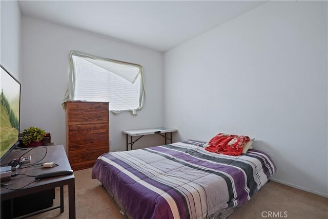 bedroom with light colored carpet