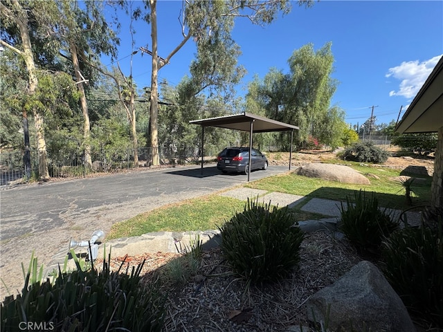 view of yard featuring a carport