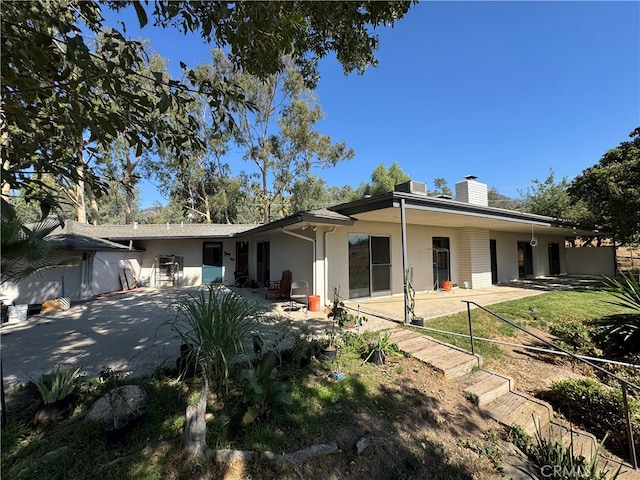 rear view of house with a patio area