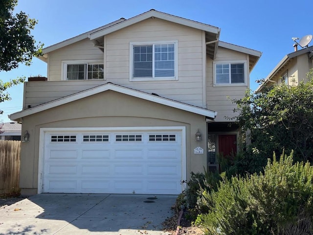 front of property with a garage