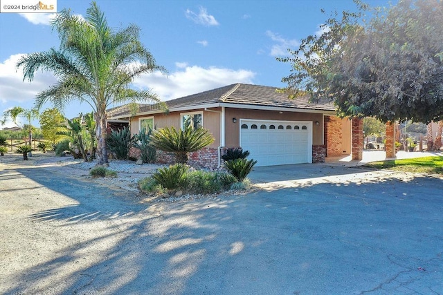 view of front of property featuring a garage