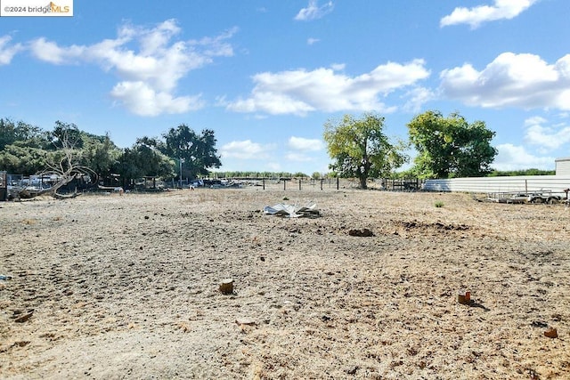 view of yard with a rural view