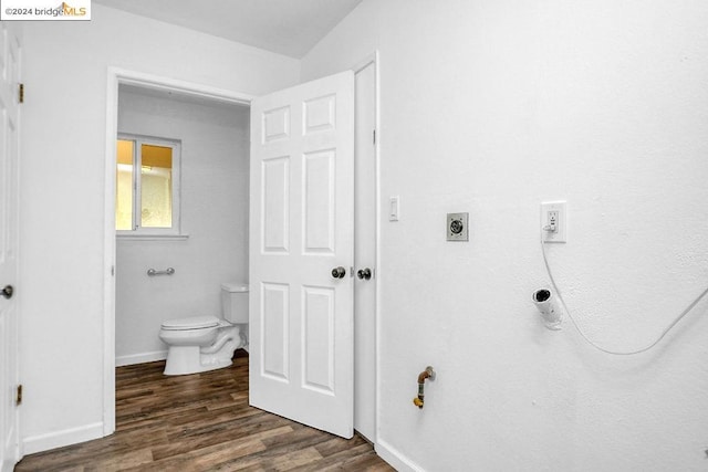 bathroom featuring toilet and hardwood / wood-style flooring