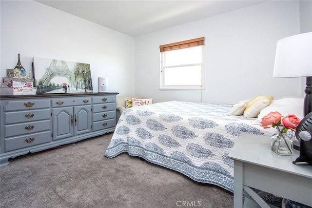 bedroom featuring light colored carpet