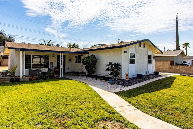 view of front facade featuring a front yard