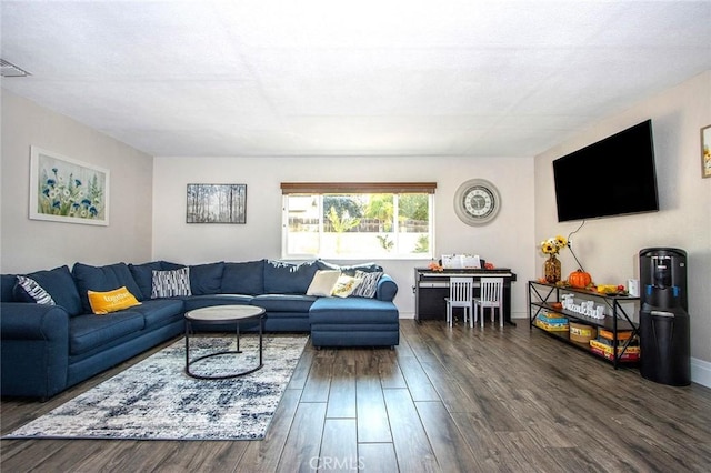 living room with dark hardwood / wood-style floors