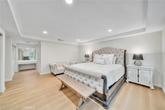 bedroom featuring light hardwood / wood-style floors