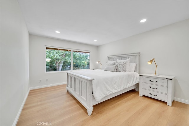 bedroom featuring light wood-type flooring