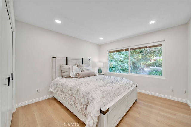 bedroom featuring light wood-type flooring