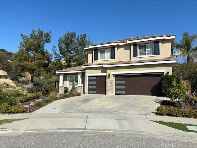 view of front of property featuring a garage