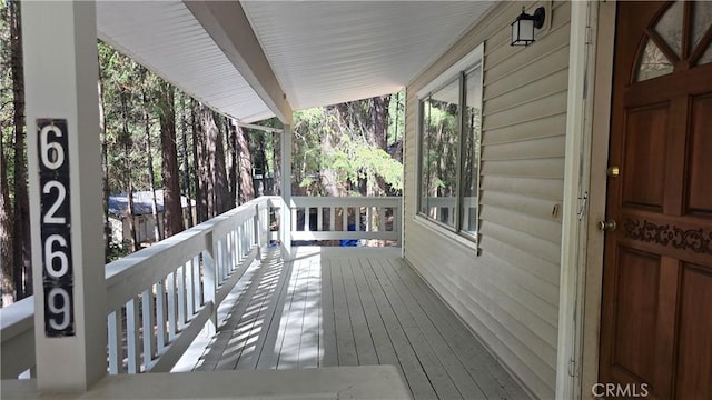 deck featuring covered porch
