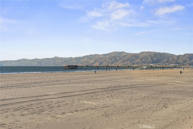 property view of mountains featuring a water view