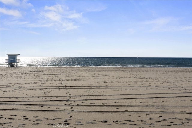 property view of water featuring a view of the beach