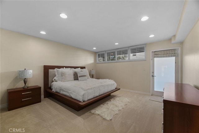 bedroom with light carpet