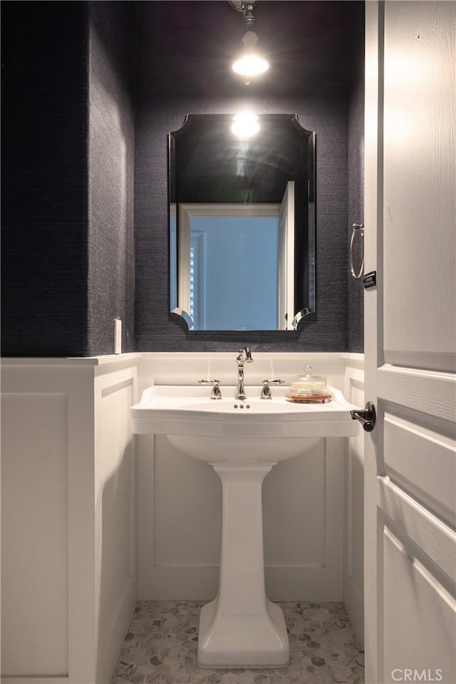 bathroom featuring tile patterned floors and sink