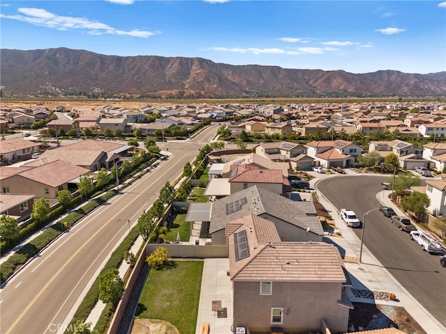 drone / aerial view with a residential view and a mountain view