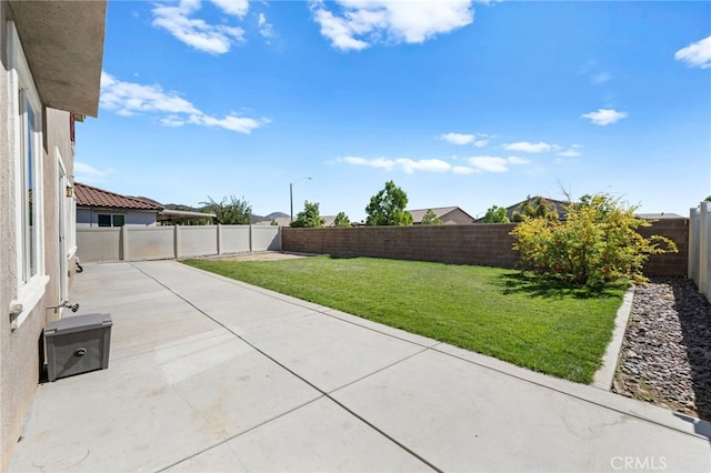 exterior space with a fenced backyard