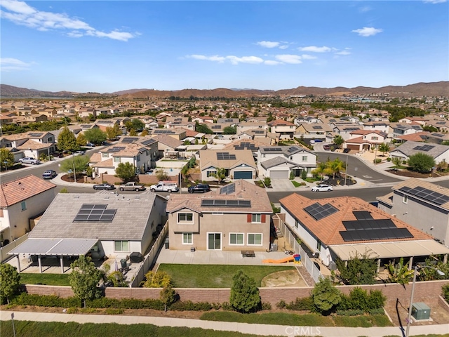 bird's eye view with a residential view and a mountain view