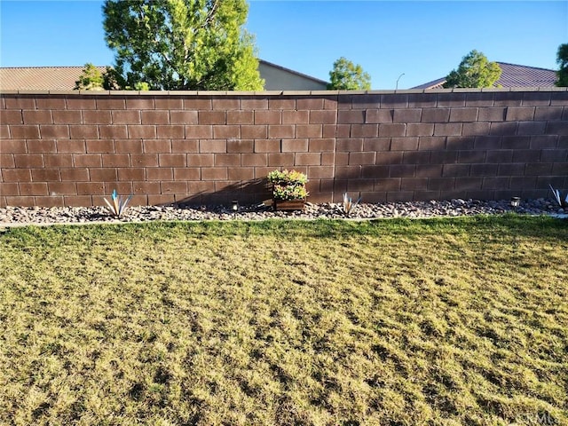 view of yard with fence