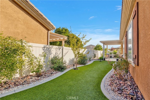 view of yard featuring a pergola and a patio area