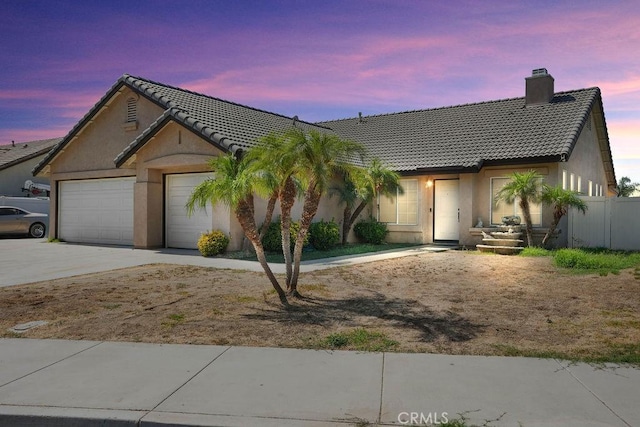 view of front of house with a garage