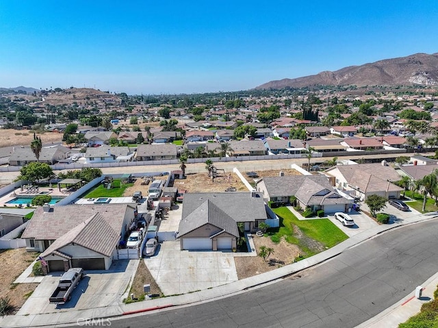 drone / aerial view featuring a mountain view