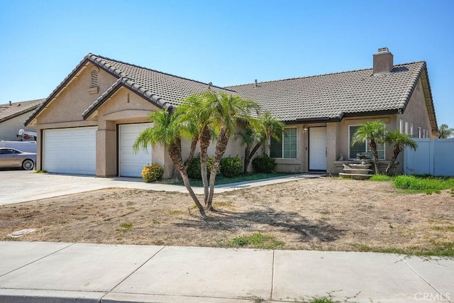 ranch-style home with a garage