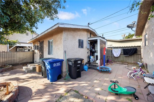 rear view of house with a patio area