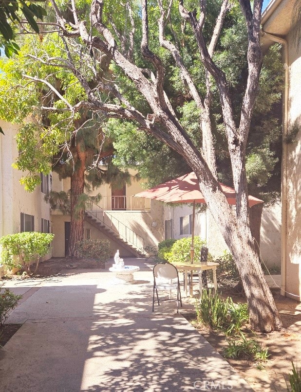 view of community with a patio area