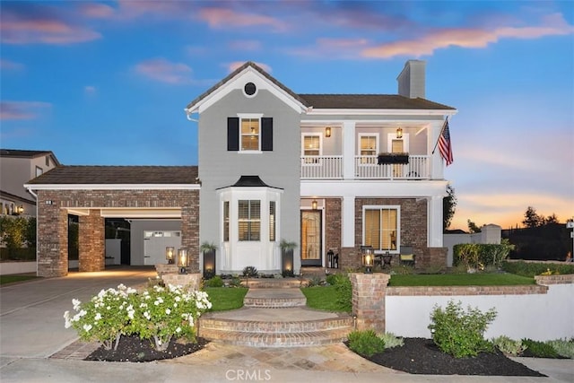 view of front of home with a balcony