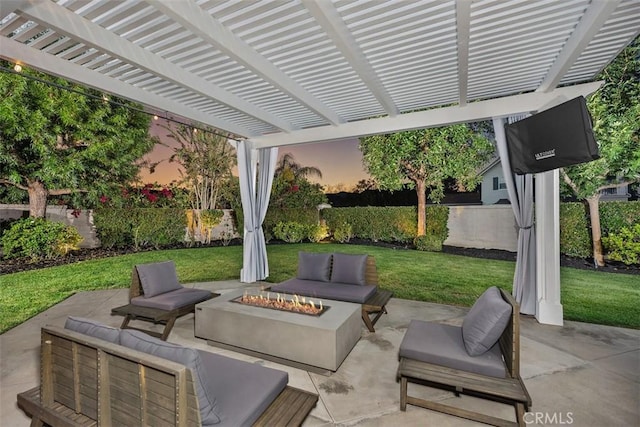 view of patio / terrace with a pergola and an outdoor living space with a fire pit