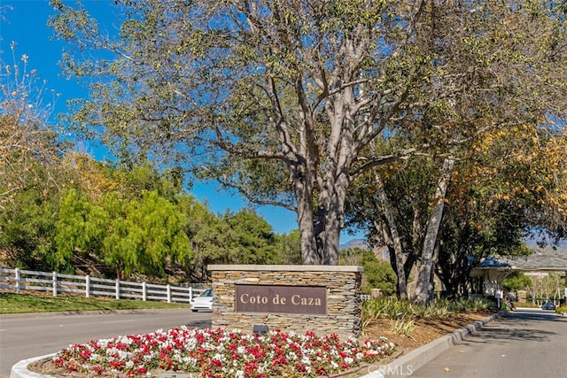 view of community sign