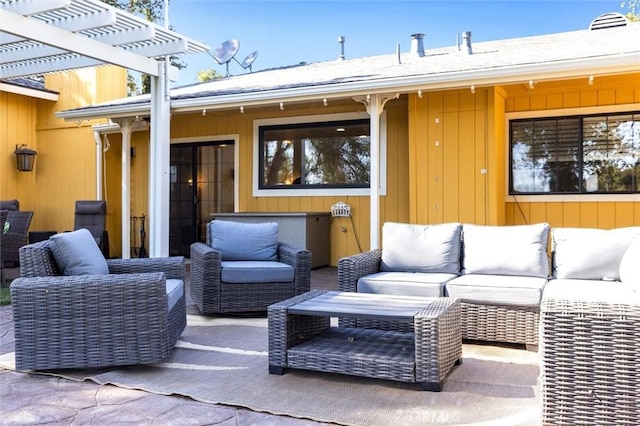 view of patio with a pergola and outdoor lounge area