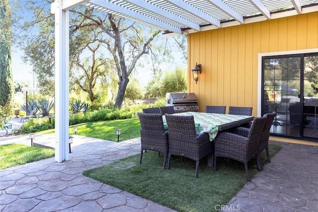 view of patio / terrace featuring grilling area and a pergola