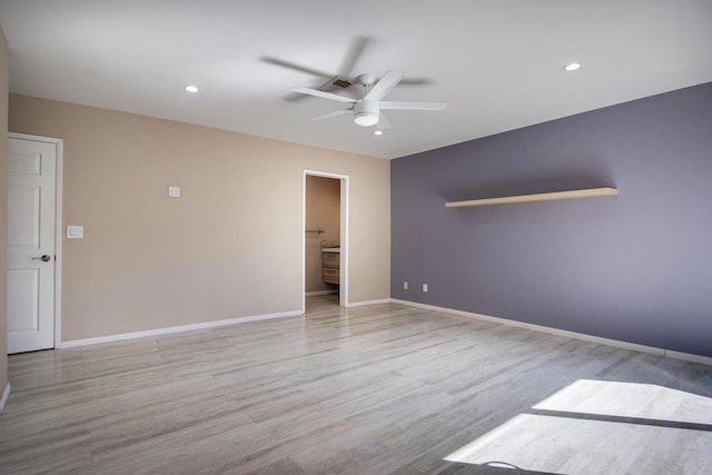 unfurnished bedroom with light hardwood / wood-style floors, ensuite bath, and ceiling fan