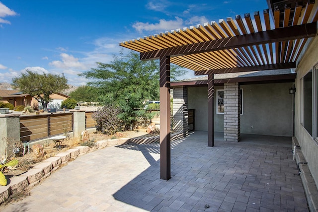 view of patio featuring a pergola