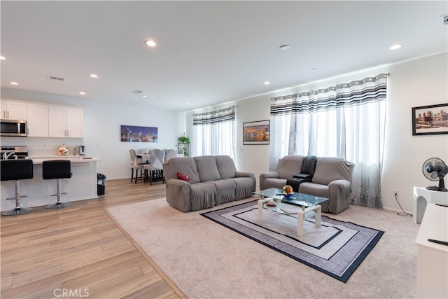 living room featuring light wood-type flooring