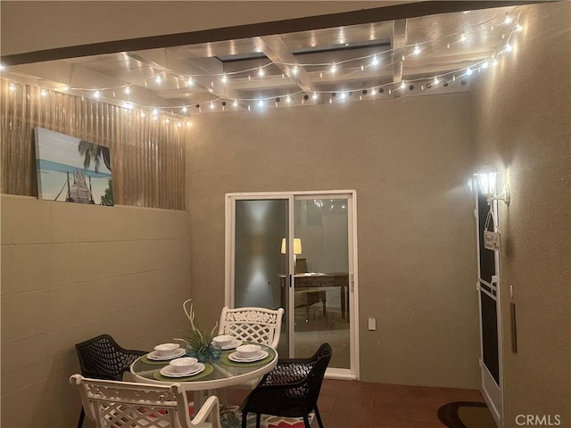 dining space featuring tile patterned flooring