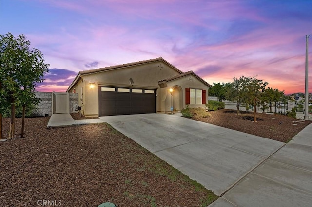 view of front of property featuring a garage