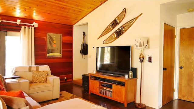 living room with vaulted ceiling, a healthy amount of sunlight, dark wood-type flooring, and wooden ceiling