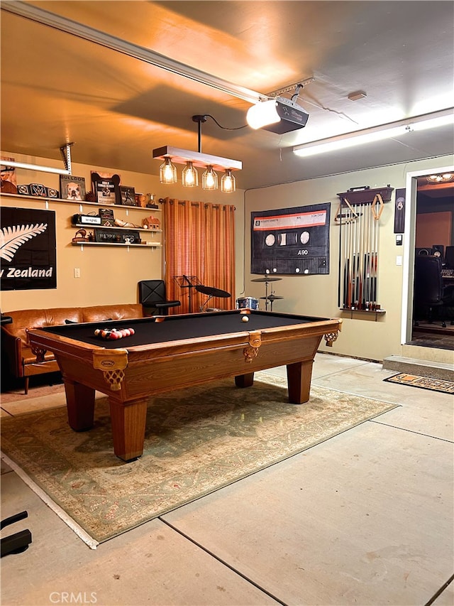 recreation room featuring concrete floors and billiards