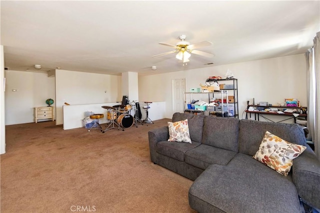 living room featuring carpet flooring and ceiling fan