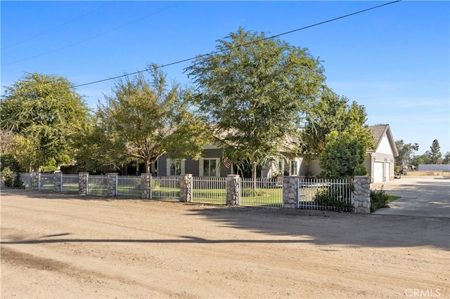 obstructed view of property featuring a garage