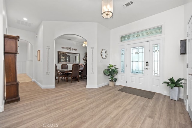 foyer entrance with light hardwood / wood-style flooring